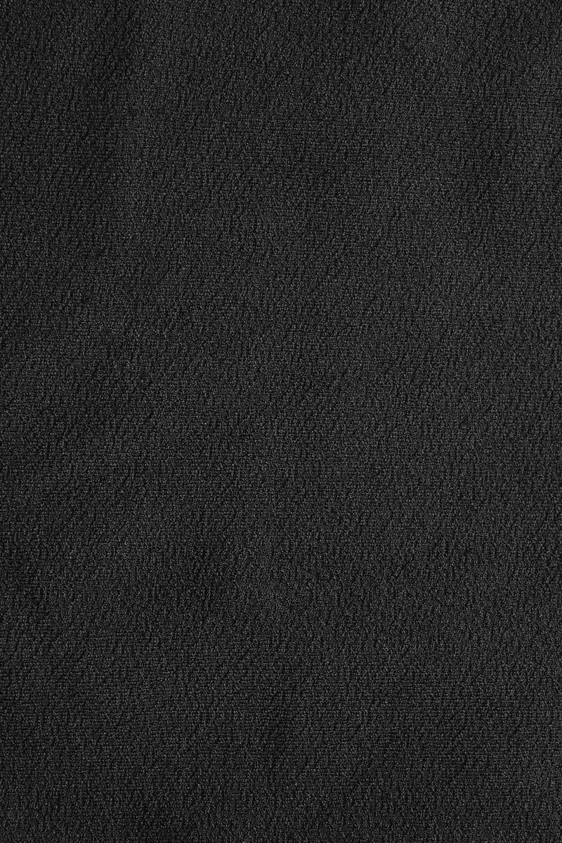 Close-up of Fearless au smooth fabric in Black - used in the Icon Bikini Bottom, designed to withstand ocean swims and pool laps