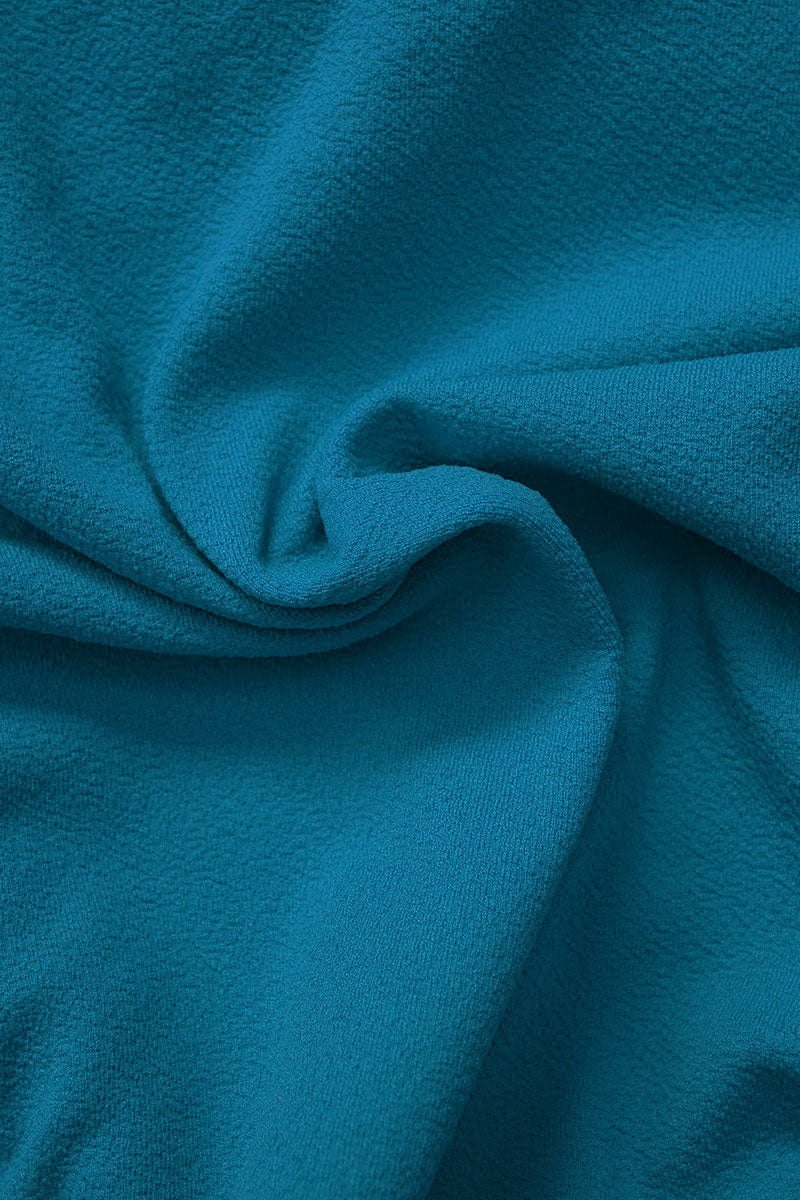 Close-up of Fearless au smooth fabric in Teal - used in the Icon Bikini Top, designed to withstand ocean swims and pool laps