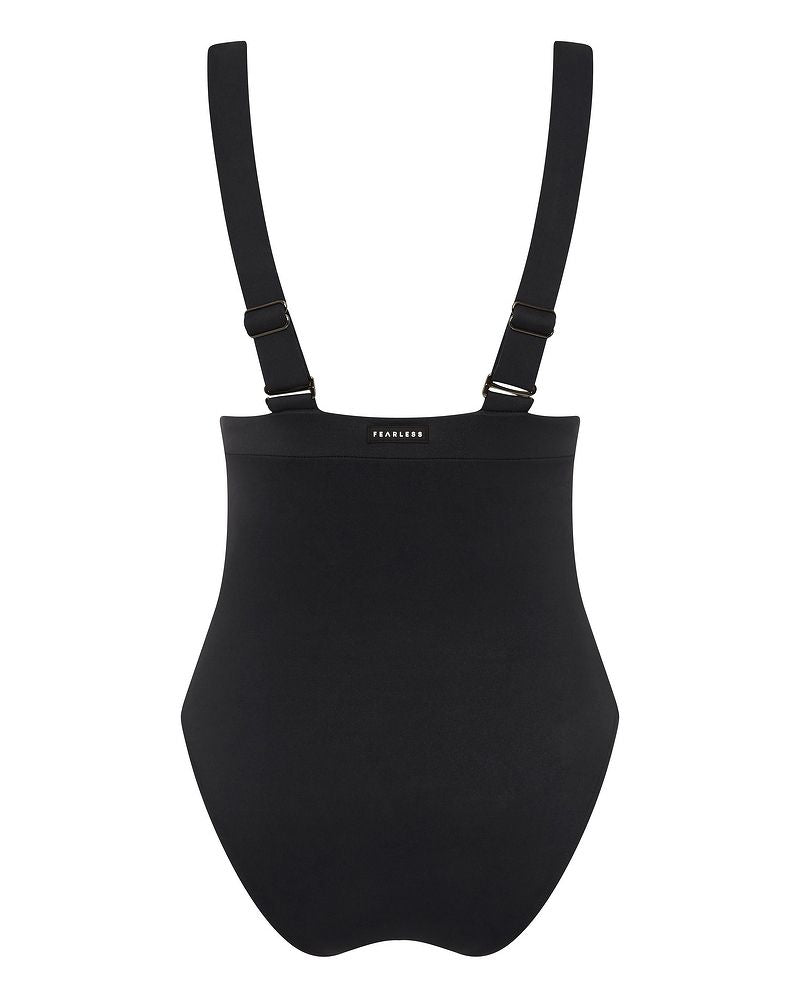 A black shapewear garment with adjustable shoulder straps and a high-waisted design. The word FEARLESS is printed in white on the front waistband.