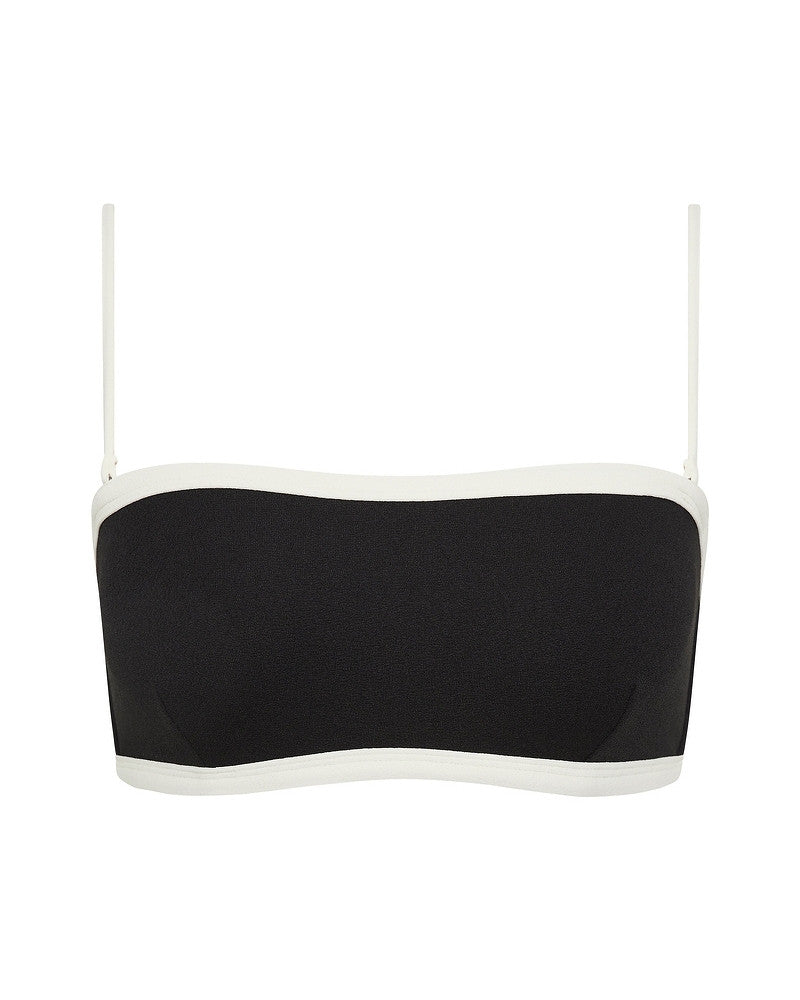 A black bandeau bikini top with thin white straps and white trim along the top and bottom edges, displayed on a plain white background.