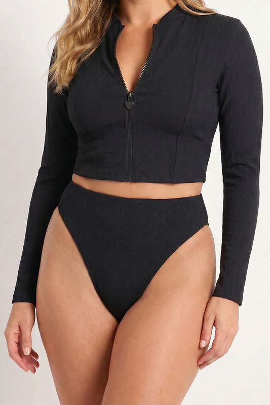Black long-sleeve swimsuit with a zipper on a white background