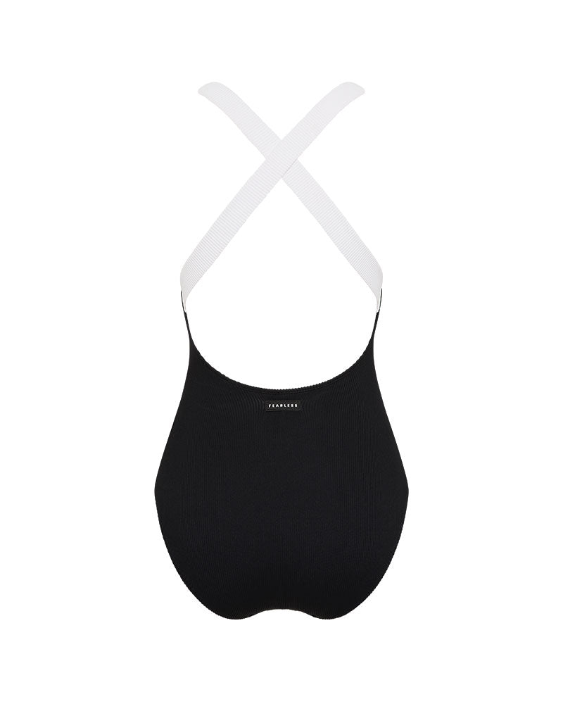Black swimsuit with white straps on a white background