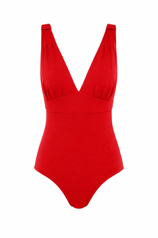 Women's red swimsuit with a deep neckline and full coverage on a white background