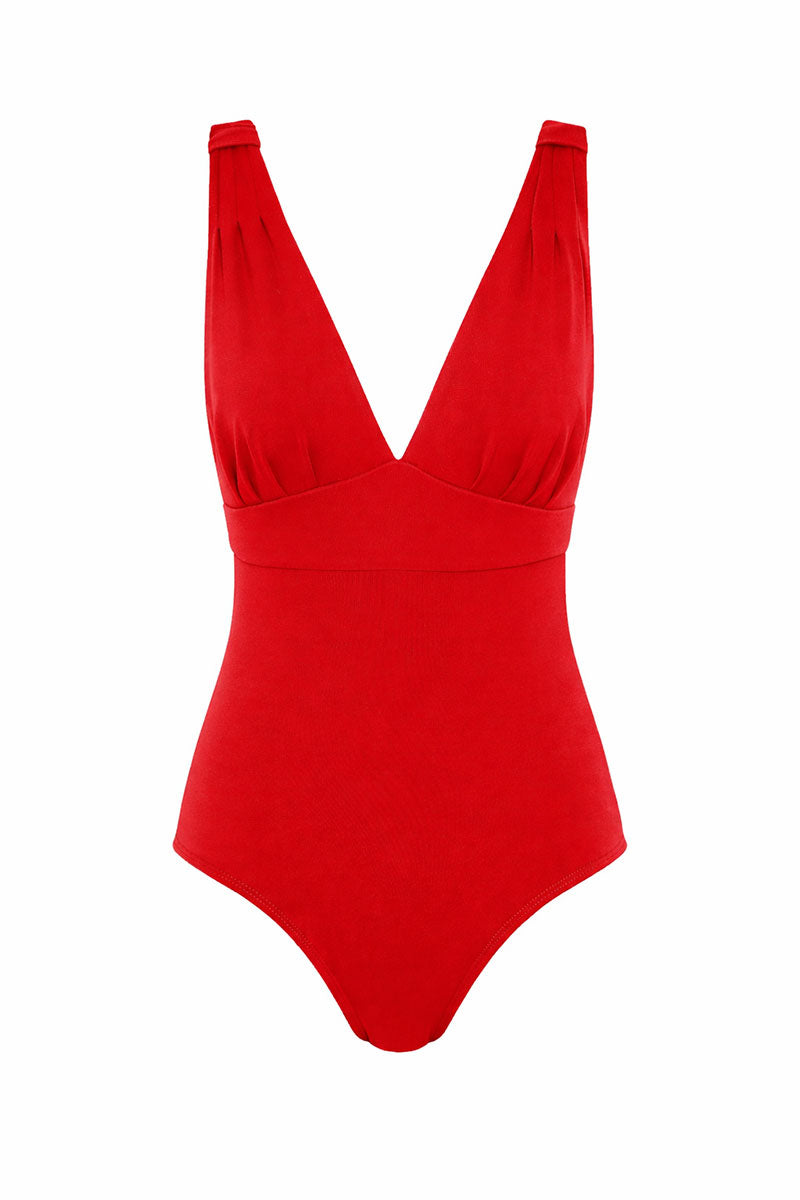Women's red swimsuit with a deep neckline and full coverage on a white background
