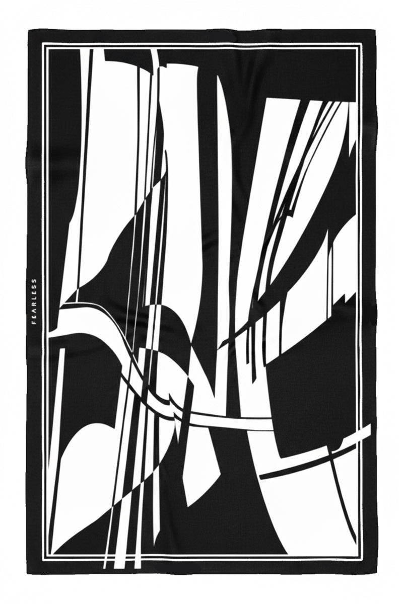 Geo Print Sarong by Fearless au features abstract black and white geometric artwork with bold intersecting lines, a rectangular border, and the word FEARLESS displayed vertically along the left edge.