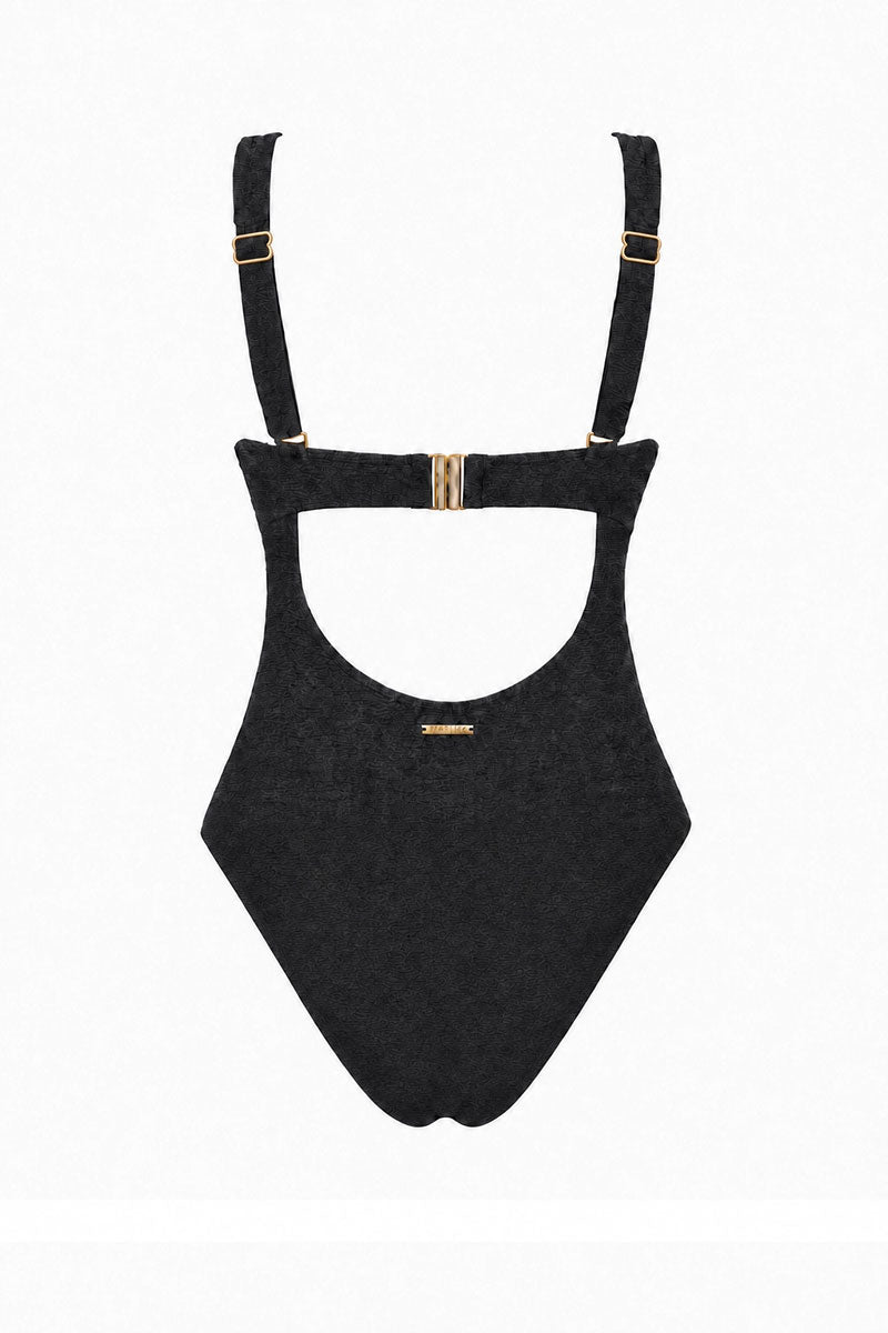 Black swimsuit with suspenders on a white background
