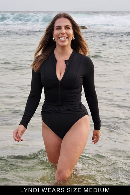 Fearless au Cropped Rashie in Black - cropped rashguard featuring long-sleeve, worn by a model
