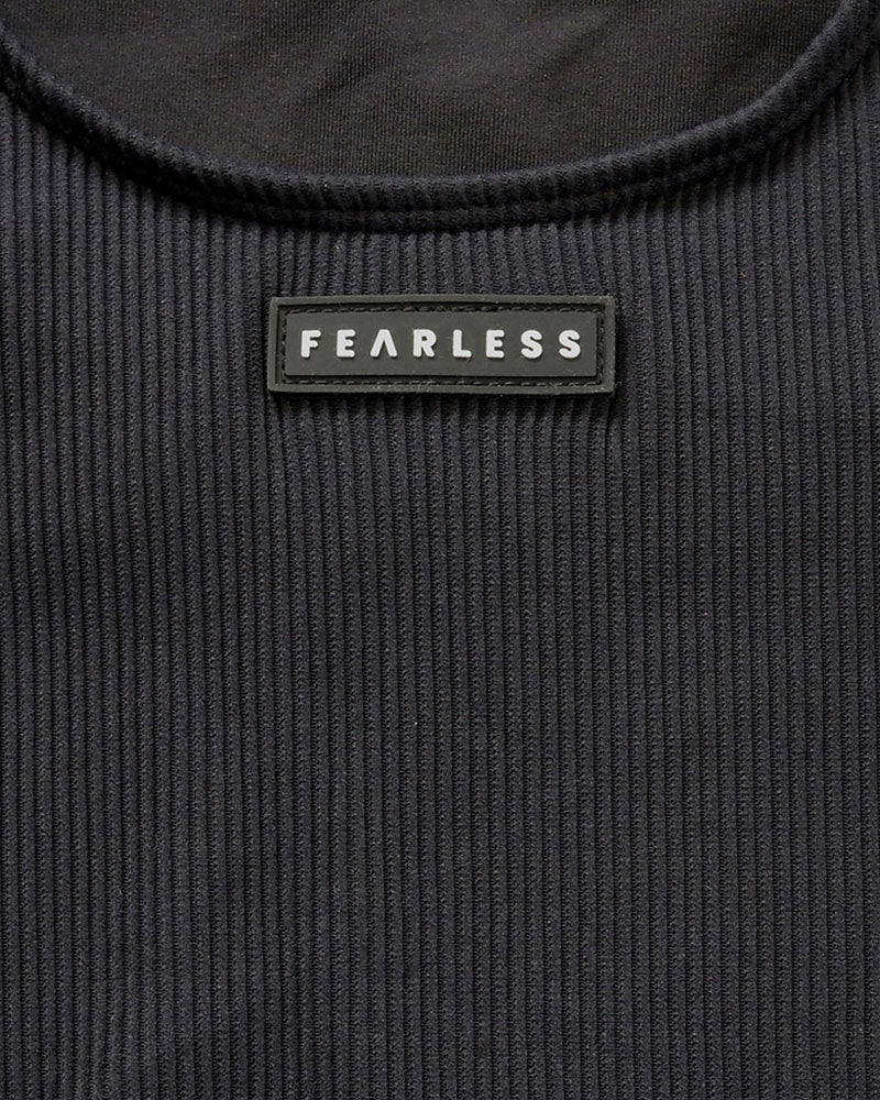 Fearless premium luxe ribbed fabric in black. Fearless swimwear is designed to withstand ocean swims, pool laps and long summer days - not stretch out after a handful of wears.