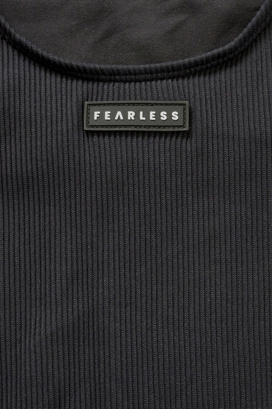 Fearless premium luxe ribbed fabric in black. Fearless swimwear is designed to withstand ocean swims, pool laps and long summer days - not stretch out after a handful of wears.