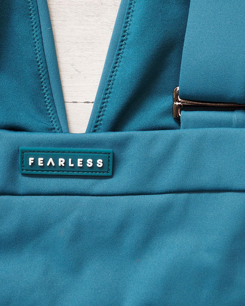 Fearless premium luxe smooth fabric in teal. Fearless swimwear is designed to withstand ocean swims, pool laps and long summer days - not stretch out after a handful of wears.