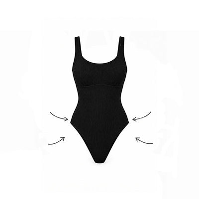 A black ribbed one-piece swimsuit or bodysuit shown flat against a white background, with four curved black arrows pointing inward near the sides to suggest shaping or contouring.