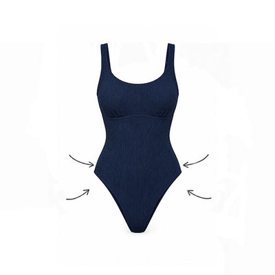 A dark navy blue ribbed one-piece swimsuit shown on a plain white background, with black arrows pointing inward near the sides to suggest a fitted or shaping effect.