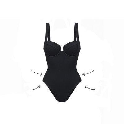 A black one-piece bodysuit or swimsuit with wide shoulder straps and a small cutout at the bust, shown on a plain white background with curved arrows pointing inward near the sides.