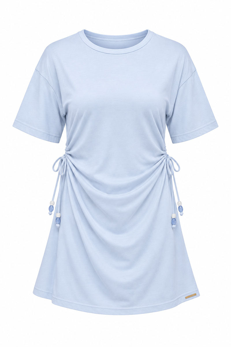 Dusty blue lace up dress on a white background