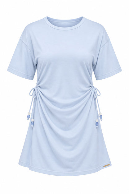 Dusty blue lace up dress on a white background
