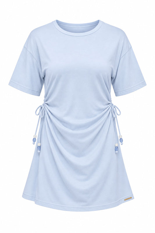Dusty blue lace up dress on a white background