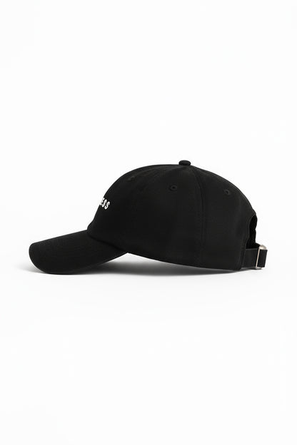 Fearless au Fearless Cap in Black - cap with curved brim, embroidered Fearless logo, adjustable back strap, shown on a white background