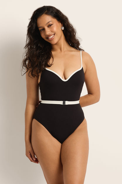 Model wearing the Fearless au Grace High Rise in Matte Black - one-piece swimsuit with high-rise boyleg cut