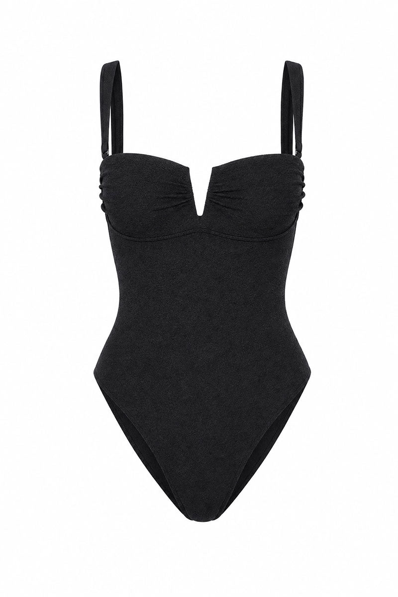 Black swimsuit with thin straps on a white background